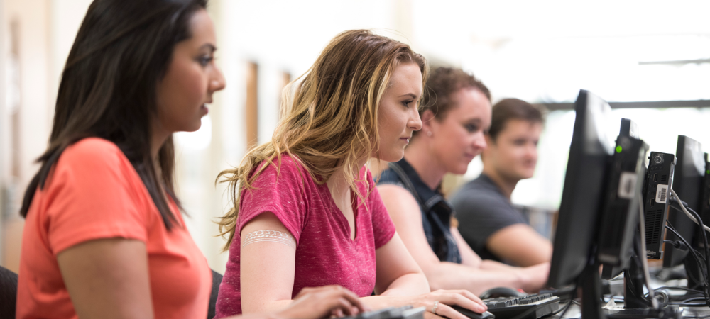 row of students in computer lab